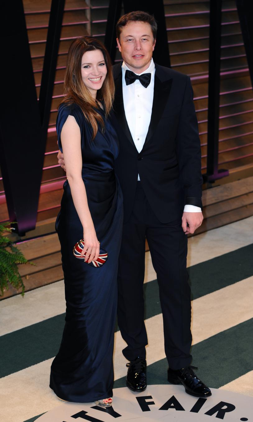 WEST HOLLYWOOD, CA - MARCH 02: Talulah Riley (L) and CEO of Tesla Motors Elon Musk attend the 2014 Vanity Fair Oscar Party hosted by Graydon Carter on March 2, 2014 in West Hollywood, California. (Photo by Anthony Harvey/Getty Images)