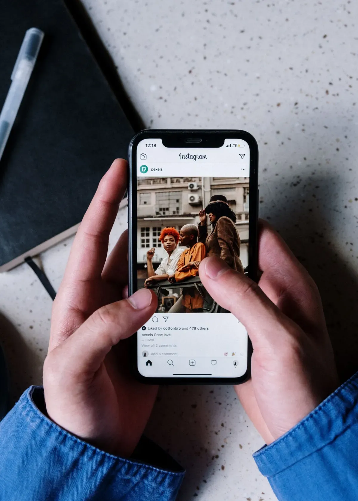 hands-browsing-instagram-on-smartphone.webp